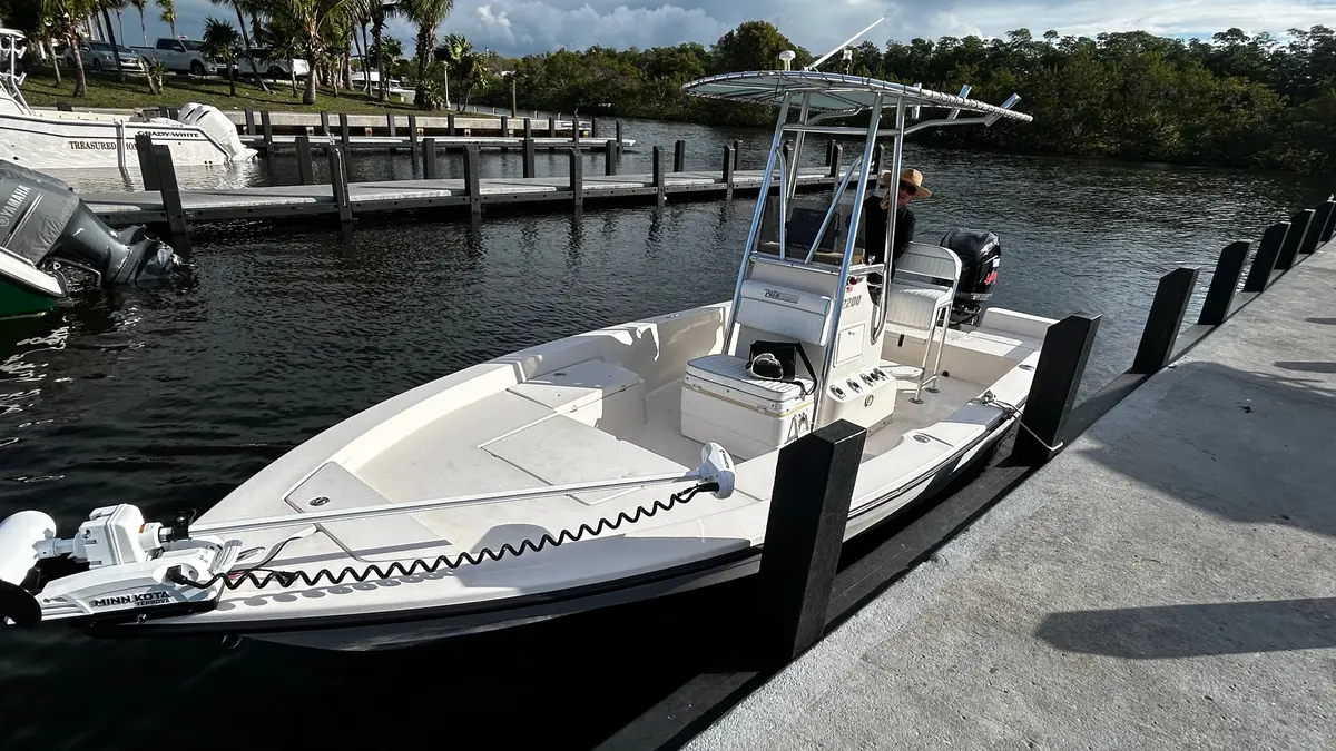 Captain at the helm on Biscayne Bay